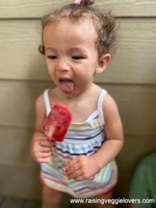 Kids enjoying lava flow popsicles.