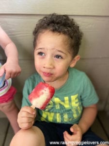 Kids enjoying lava flow popsicles.