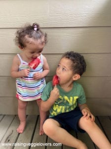 Kids enjoying lava flow popsicles.