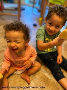 Easton and Emmalee enjoying orange creamsicles.