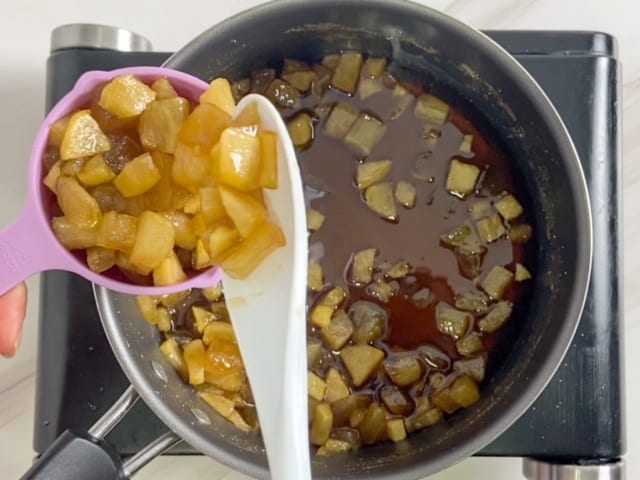 Making apple syrup.