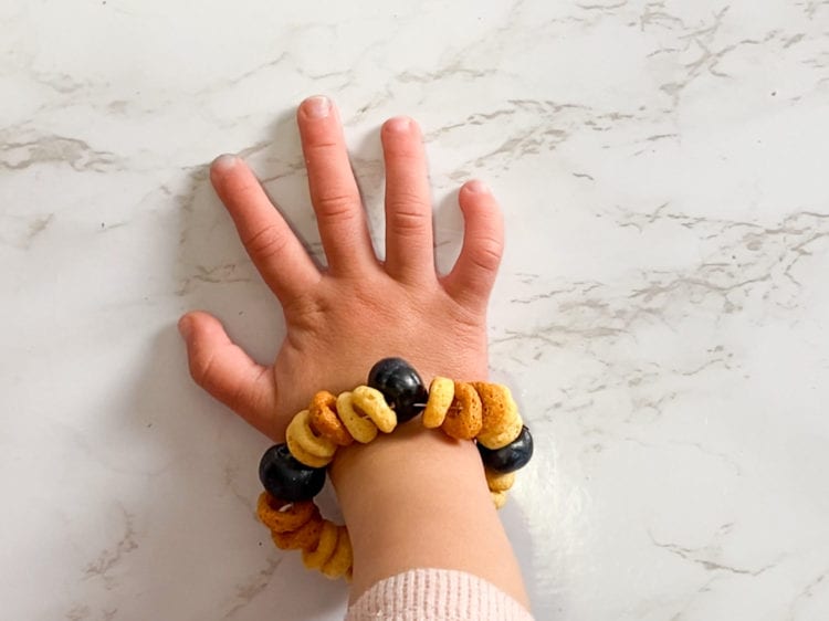 DIY Cereal Jewelry for Babies and Toddlers - Raising Veggie Lovers