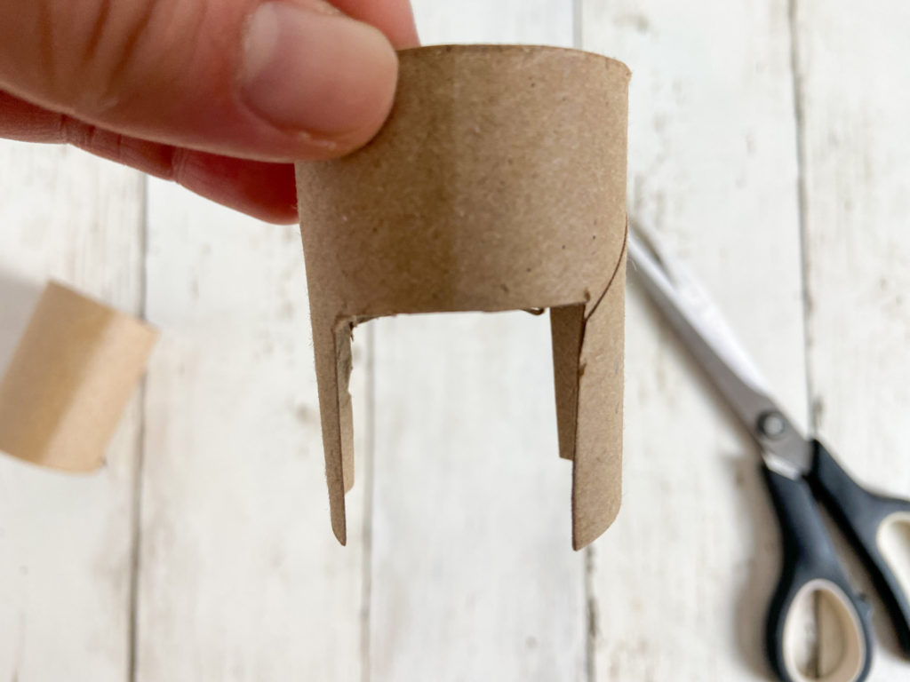 cutting toilet paper roll