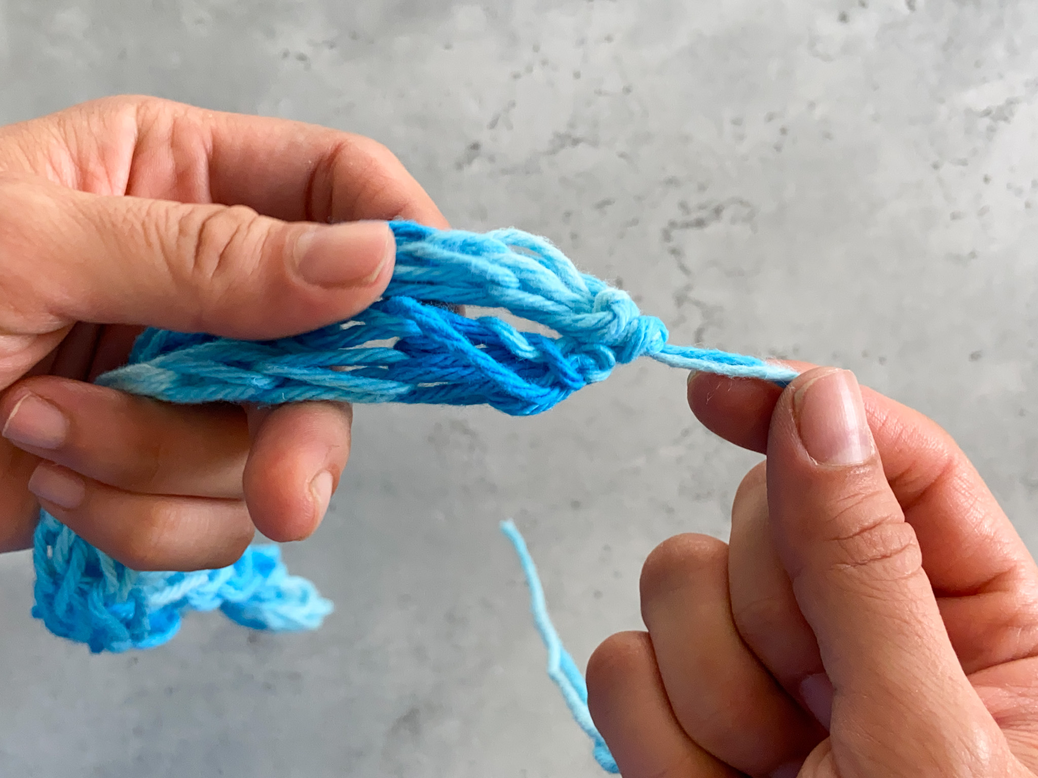 Finger Knit Yarn Leis - Tutorial - Designs By Miss Mandee