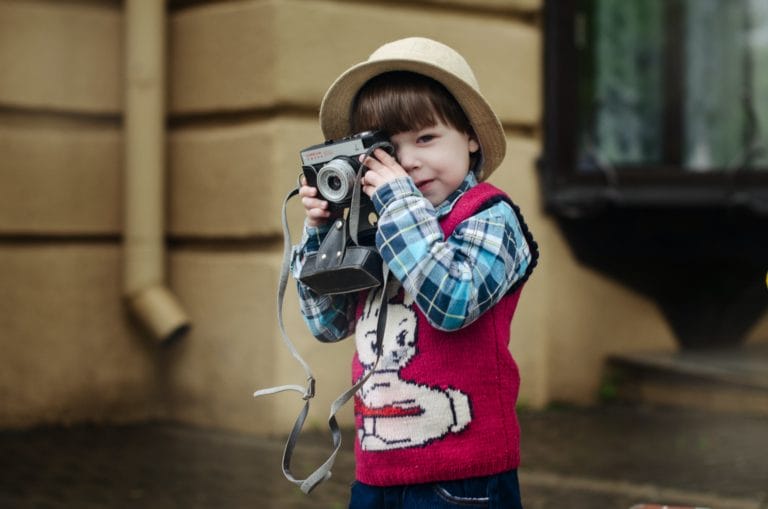 kid taking picture
