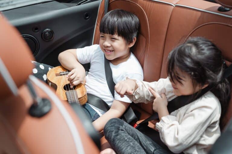 kids riding in a car