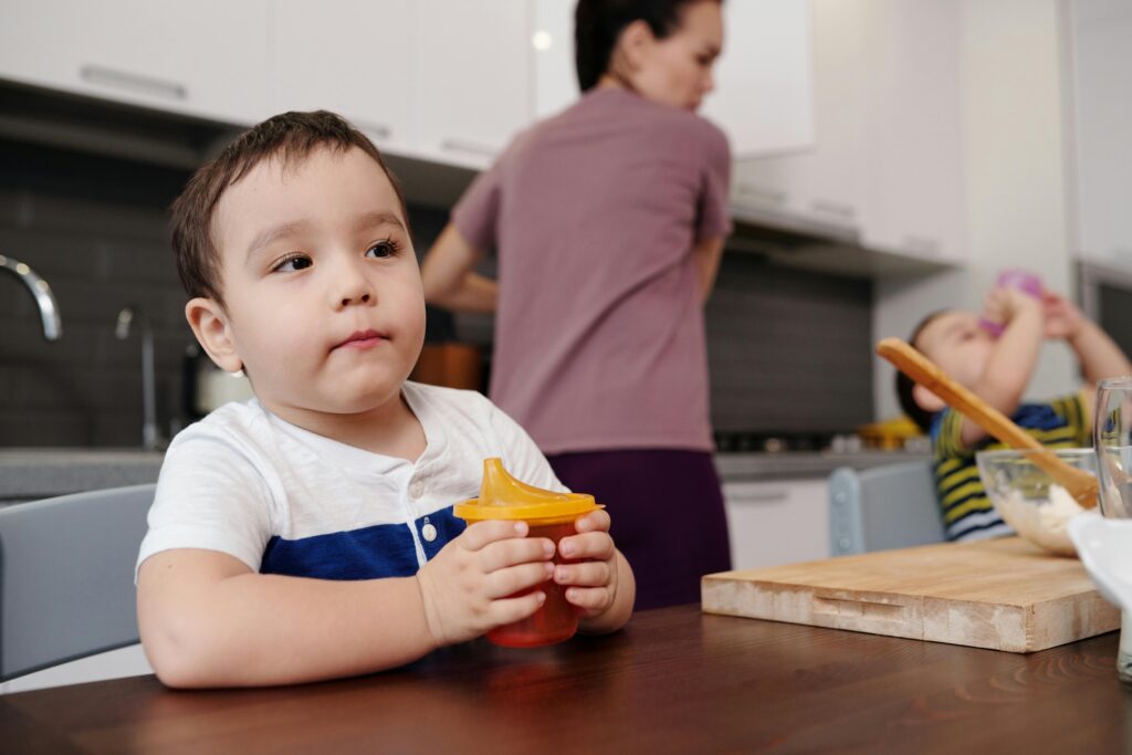 toddler with sippy cup