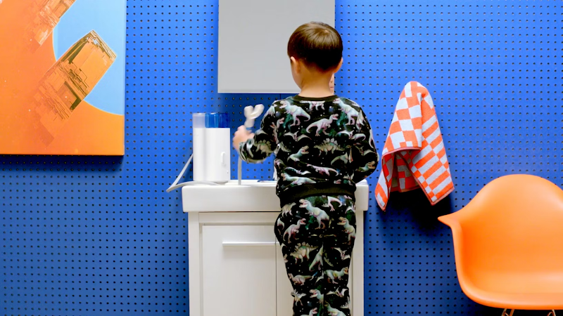 boy brushing teeth