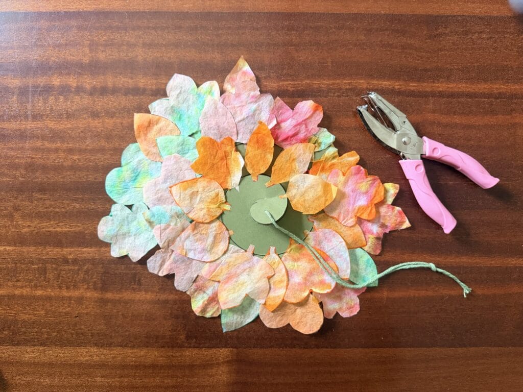 Fall leaves spinner with whole punched on top