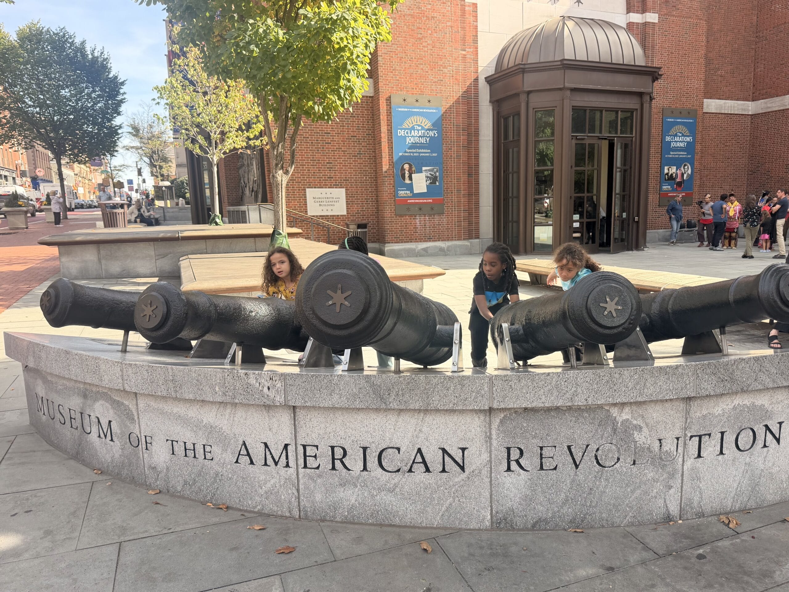 Kids in front of Museum of American Revolution.